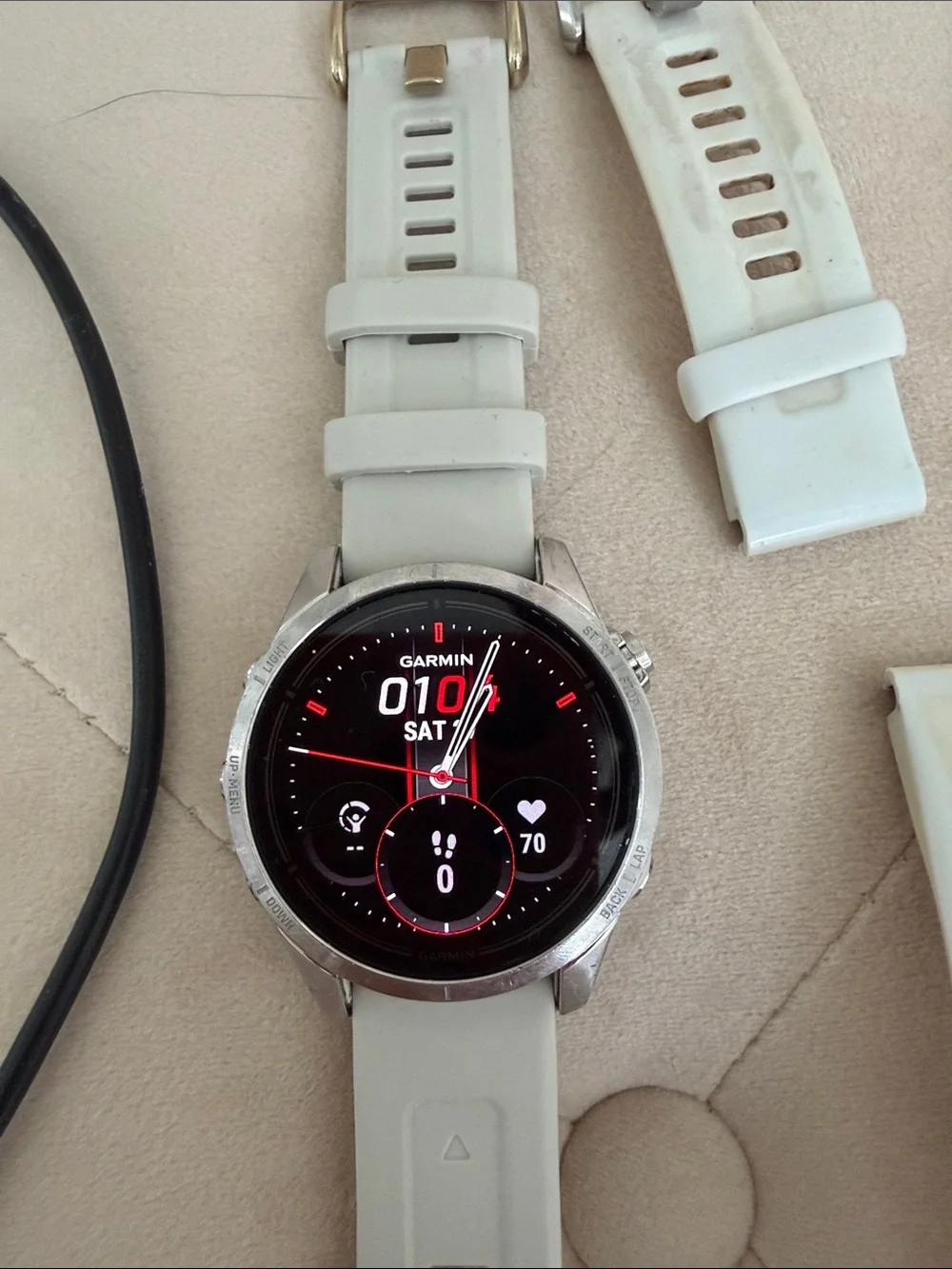 Garmin Epix Pro watch with two additional wristbands and charging cord